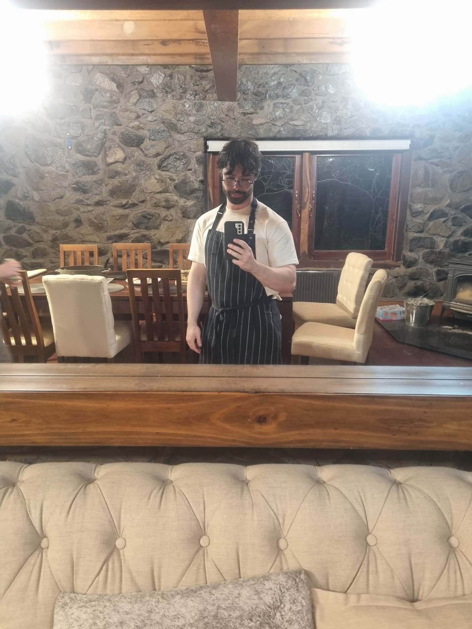 Man in the mirror after cooking for twenty people